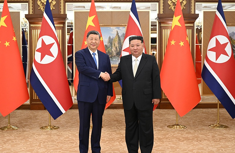 习近平同金正恩举行会谈